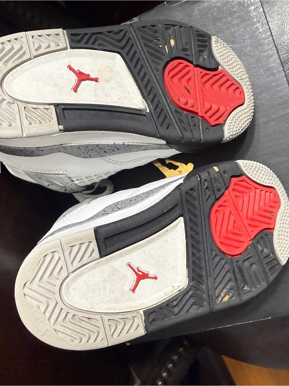 Nike Kids White Sneakers with Black Soles and Red Jumpman